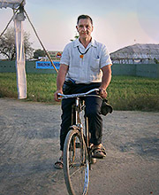 Nicolas Soames on a bicycle